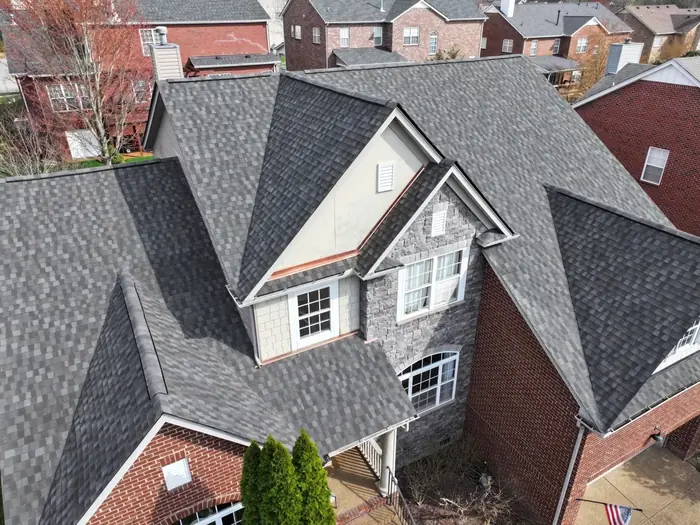 Steep multi-gable roof replacement on a brick home in Middle Tennessee