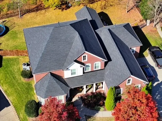 Brick and siding home with a new roof and portico, Middle Tennessee