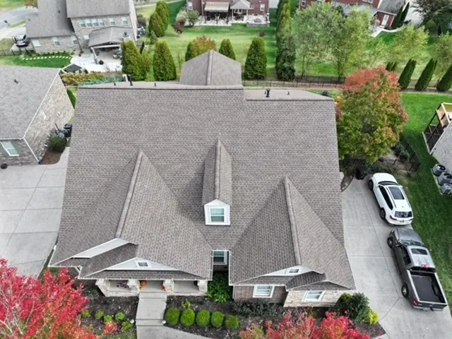 Stone and brick estate with a new multi-gable shingle roof, Williamson County TN