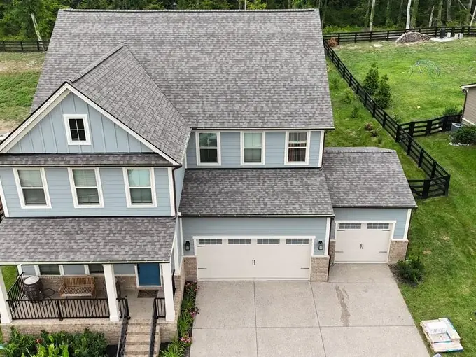 Light blue craftsman home with a new roof and two-car garage, Mt. Juliet TN