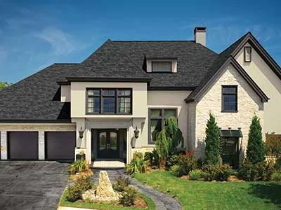 Home with a GAF architectural shingle roof system installed by Three Stone