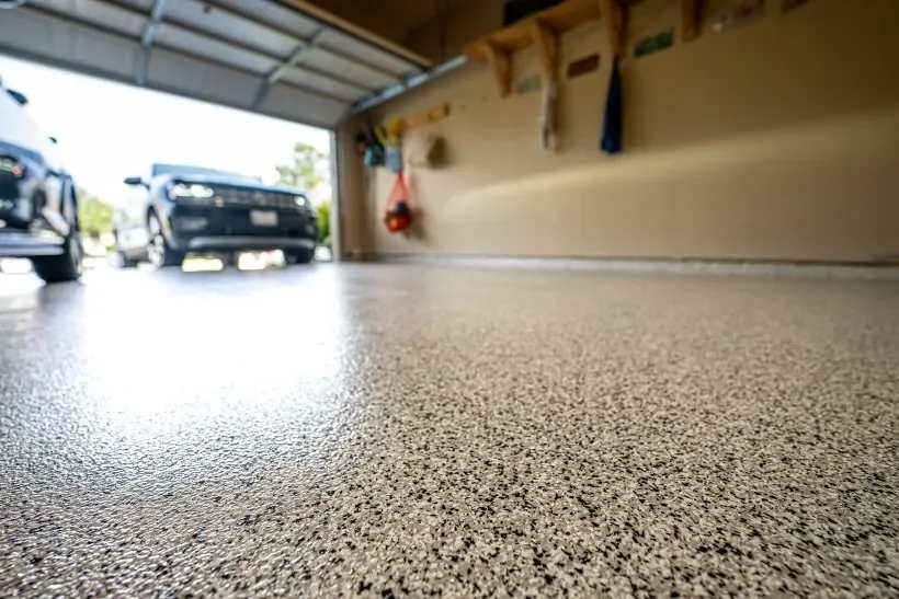 Residential garage floor with a decorative flake polyurea coating