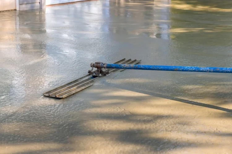 Outdoor concrete driveway coating applied by Three Stone