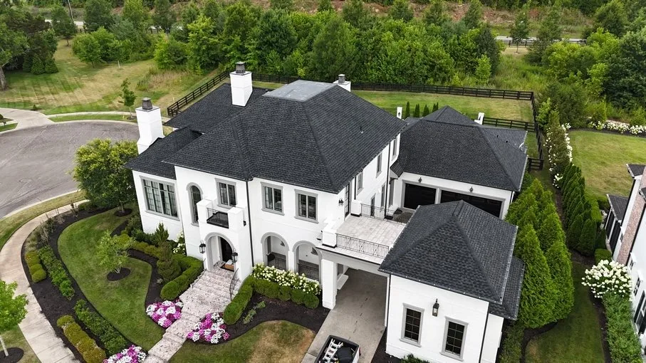 New roof installation on a white colonial home in Franklin, TN