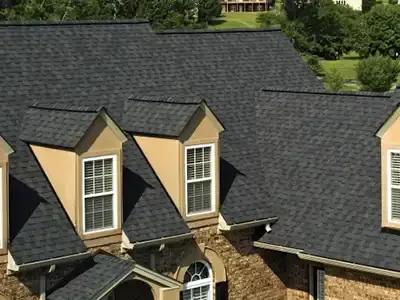 Close-up of architectural shingles installed by Three Stone